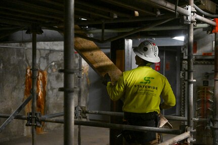 A member of the Joint Task Force-Red Hill (JTF-RH) sets up scaffolding at the Red Hill Bulk Fuel Storage Facility (RHBFSF), Halawa, Hawaii, Jan. 4, 2024.