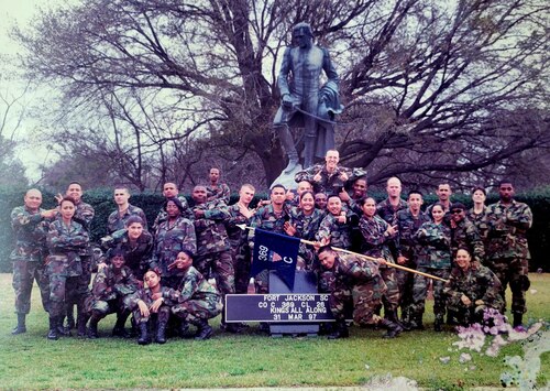 Master Sgt. Manuel Salinas, a recruiter assigned to the 353rd Recruiting Squadron, March Air Reserve Base, Calif. poses with his U.S. Army basic training teammates upon graduation March 31, 1997. (Courtesy photo)