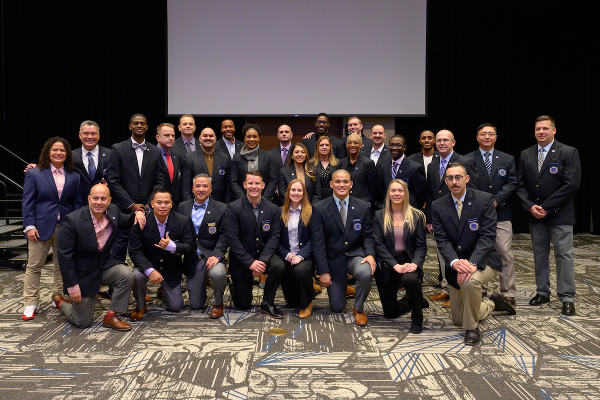 Air Force Reserve recruiters pose for a group photo during their annual training event Nov. 5, 2023 at St. Charles, Ill.