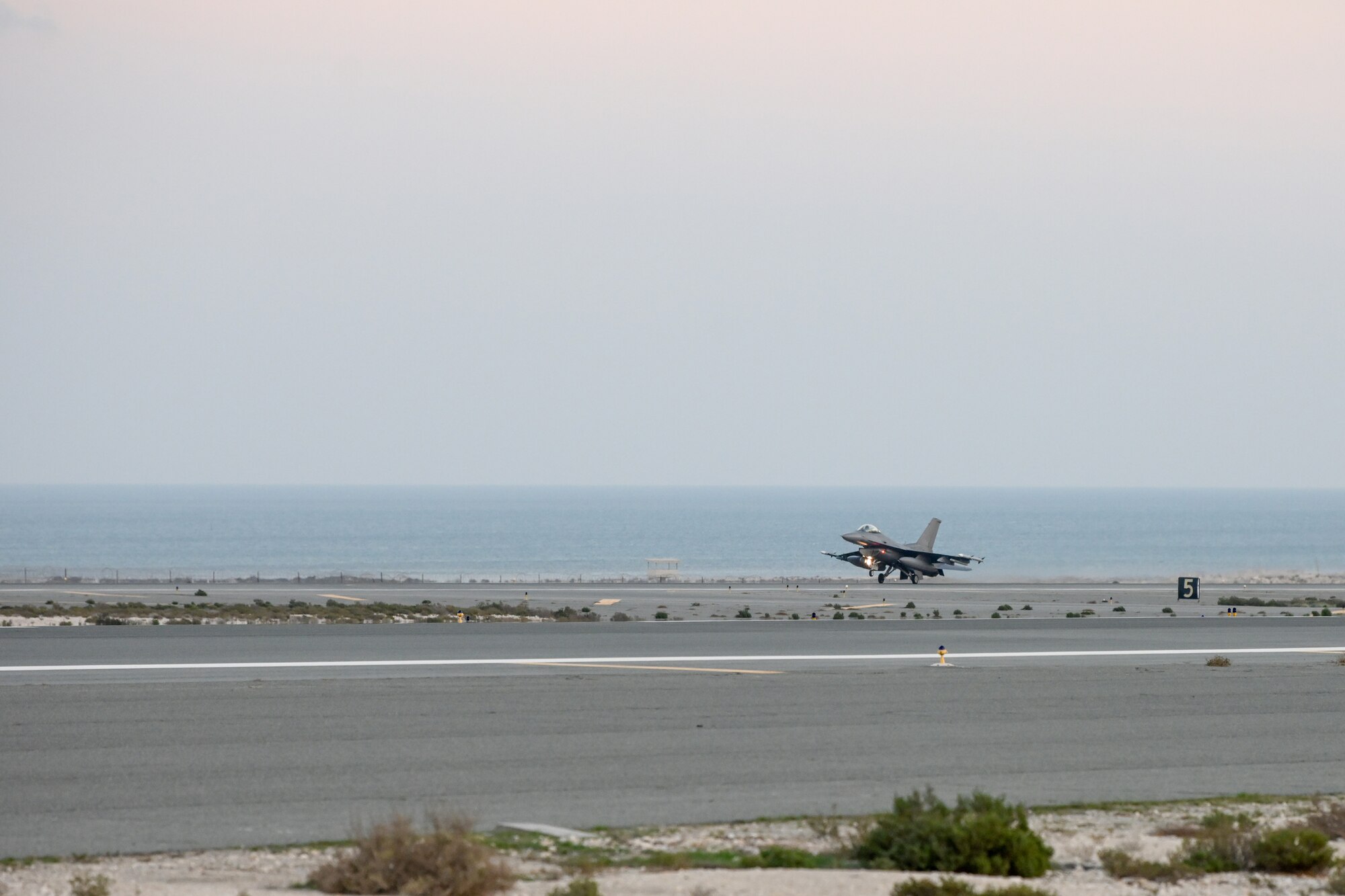 A U.S. Air Force F-16 Fighting Falcon arrives at an undisclosed location in preparation for Exercise Ballast Cannon 24.3 in the U.S. Central Command area of responsibility, Jan. 6, 2024.