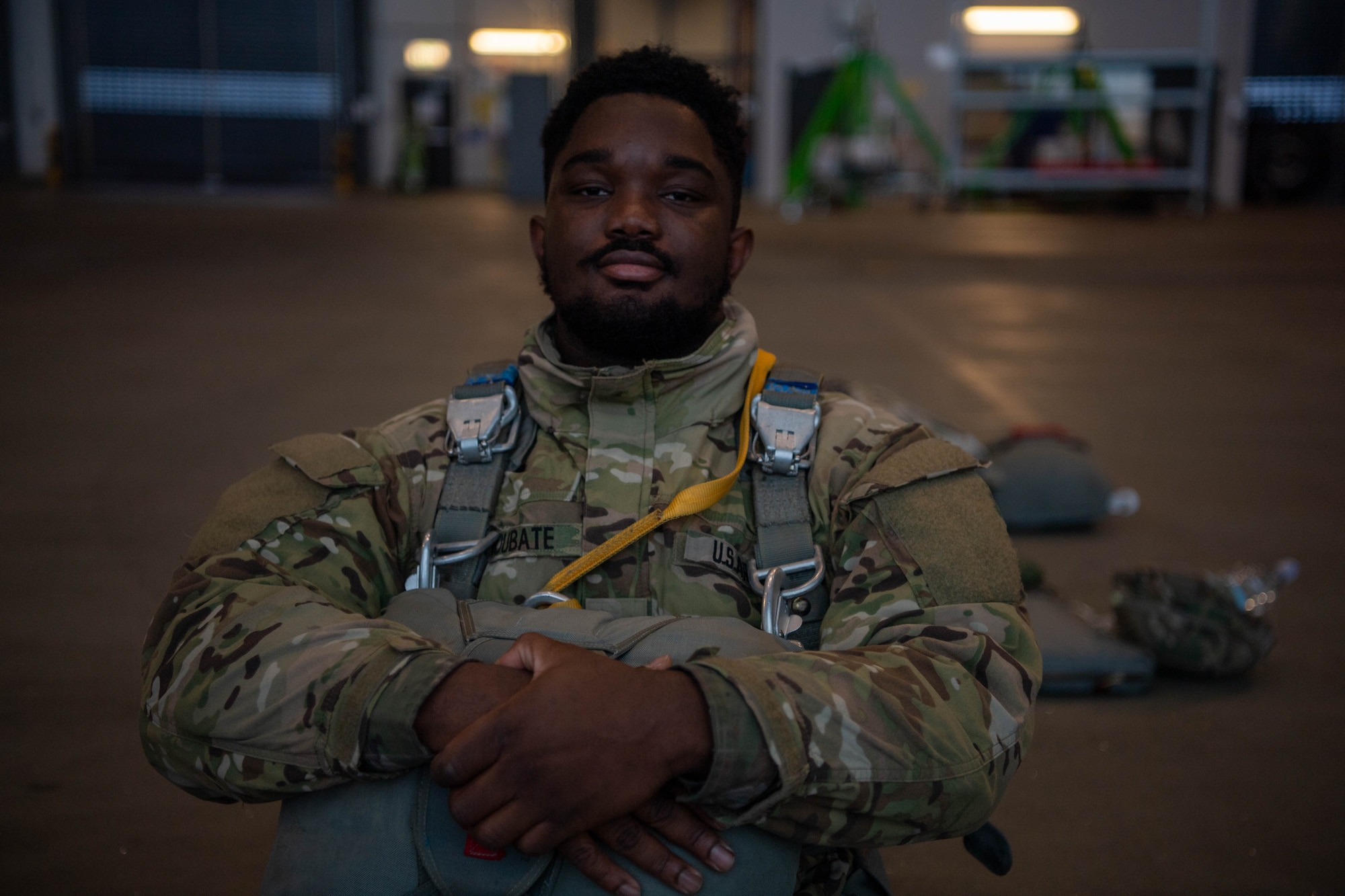 U.S. Army Sgt. Sidiki Dioubate, 5th Quartermaster parachute rigger, prepares to board a C-130J Super Hercules aircraft assigned to the 37th Airlift Squadron at Ramstein Air Base, Germany, Dec. 15, 2023.