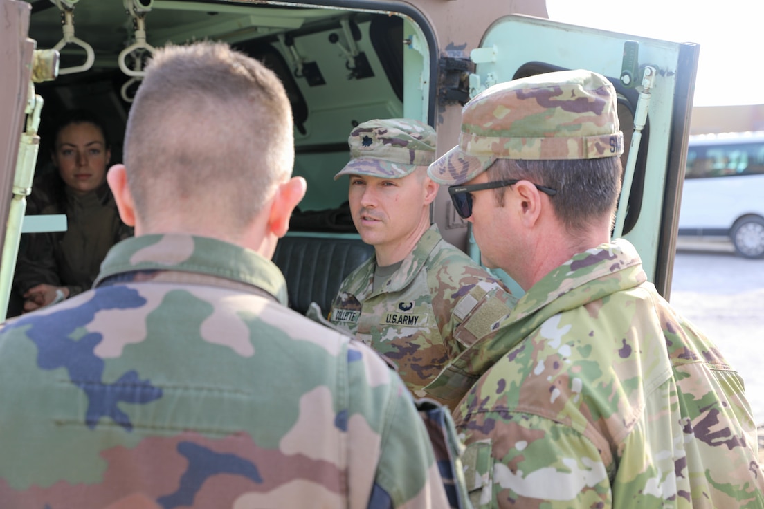 U.S. Army Lt. Col. Thomas Collette, commander, 421st Multifunctional Medical Battalion, 30th Medical Brigade, 21st Theater Sustainment Command, and Maj. Louis Smith, support operations officer, 421st MMB, 30th MB, 21st TSC, are shown inside a French armored forward vehicle by a medic in the French Medical Regiment, RMED, at a medical support detachment in phase two of the French-led exercise, Orion 23, in Sète, France, March 3, 2023.