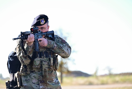 U.S. Air Force Master Sgt. Eric Emerson, 17th Security Forces Squadron standardization and evaluation superintendent, aims a rifle, Goodfellow Air Force Base, Texas, Dec. 5, 2023. Emerson plans to finish his Air Force career with 20 years under his belt. (U.S. Air Force photo by Airman 1st Class Madison Collier)
