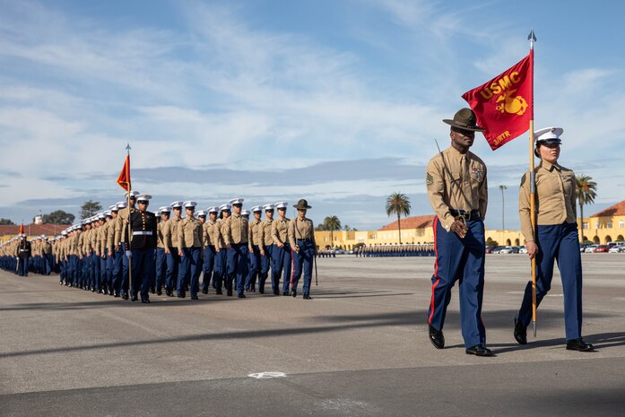 U.S. Marines with Lima Company, 3rd Recruit Training Battalion, march in formation during a graduation ceremony at Marine Corps Recruit Depot San Diego, Dec. 20, 2023. Graduation took place at the completion of the 13-week transformation process, which included training for drill, marksmanship, basic combat skills, and Marine Corps customs and traditions. (U.S. Marine Corps photo by Lance Cpl. Sarah M. Grawcock)