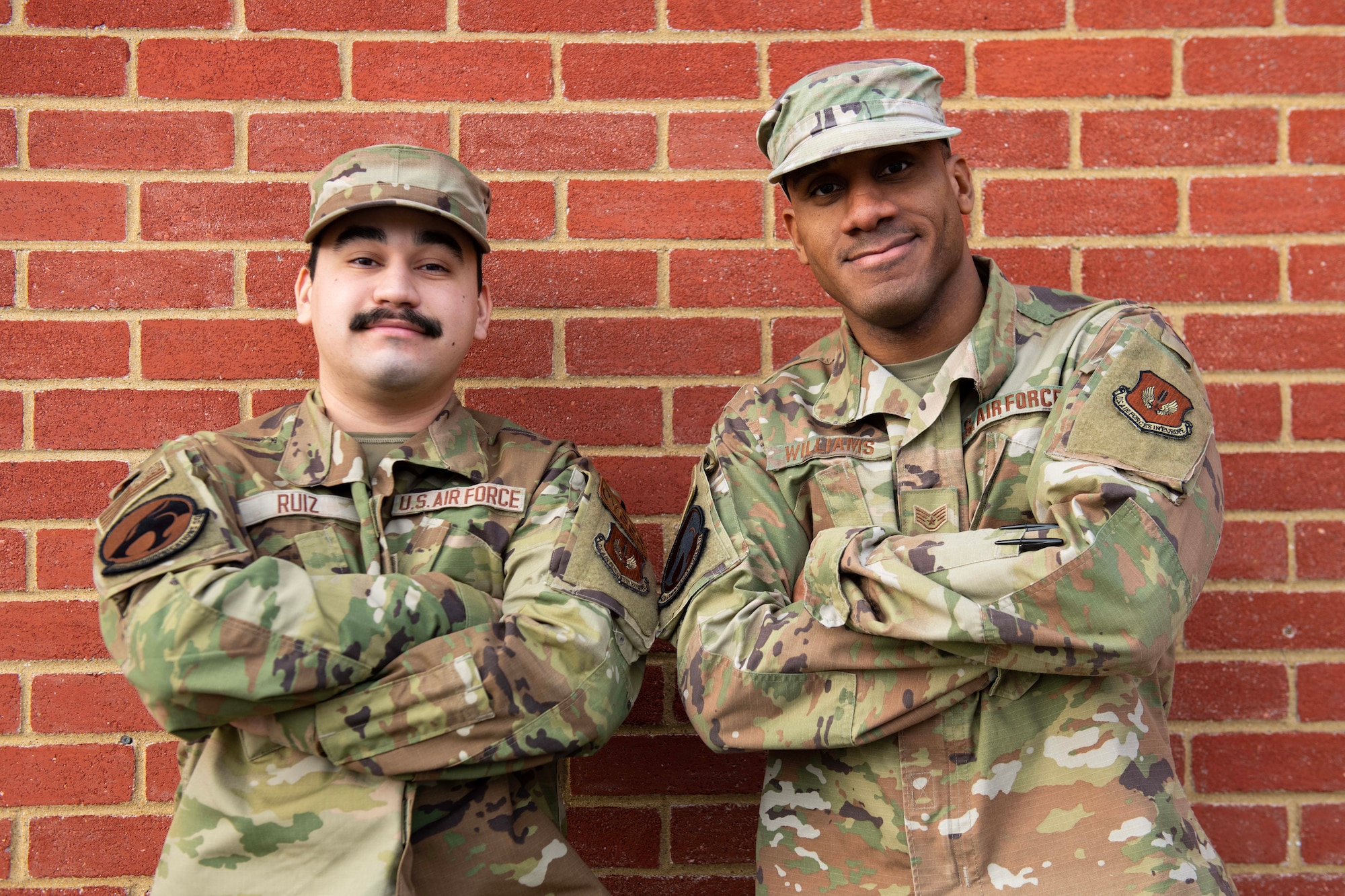 U.S. Air Force Airman 1st Class Francisco Ruiz, left, 423rd Communications Squadron client systems technician, and Staff Sgt. Reginald Williams, right, 423rd CS base equipment custodian officer, pose for a photo at RAF Alconbury, England, Jan. 5, 2024. Ruiz and Williams shared their thought on what Martin Luther King Jr. means to them. (U.S. Air Force photo by Staff Sgt. Jennifer Zima)