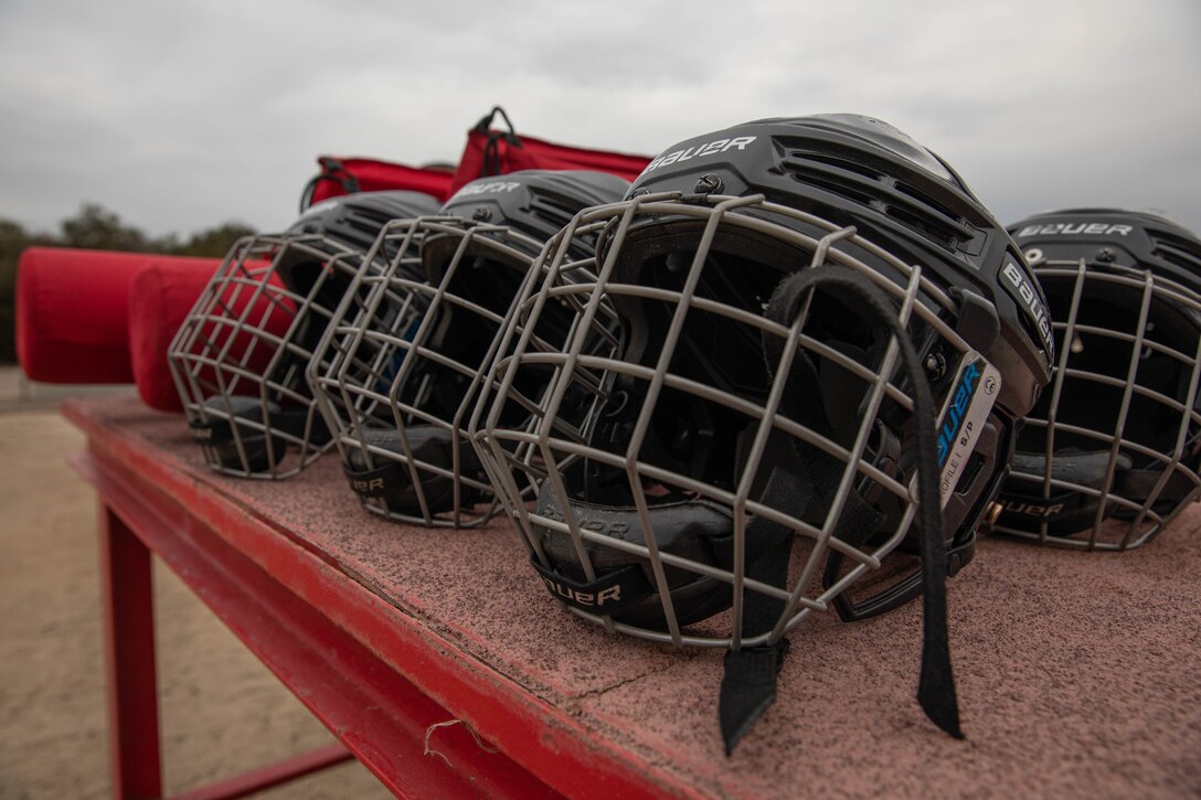 U.S. Marine Corps personal protective equipment is organized on a table for a body sparring event at Marine Corps Recruit Depot San Diego, Dec. 18, 2023. Recruits executed MCMAP techniques throughout pugil sticks teaching them self-defense and instilling a combat warrior mindset. (U.S. Marine Corps photo by Lance Cpl. Sarah M. Grawcock)