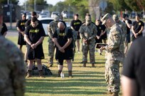 U.S. Army Soldiers take a moment of silence and prayer prior to the start of the 304th Military Police Battalion's Holistic Health and Fitness (H2F) 5K run and ruck march in Nashville, Tennessee on September 9th, 2023. During the unit's busy drill weekend, members of the H2F Performance Team from the 81st Readiness Division, the executive agent for the H2F program, visited the battalion to provide coaching and logistical support throughout the weekend. The H2F team's mission is to provide training and assistance in implementing the Army's new readiness system to those unit's currently piloting the program. The Soldier readiness program is comprised of five domains: mental, physical, nutritional, sleep, and spiritual readiness. The goal for the program is to increase overall effectiveness of the Army by investing more into Soldiers.