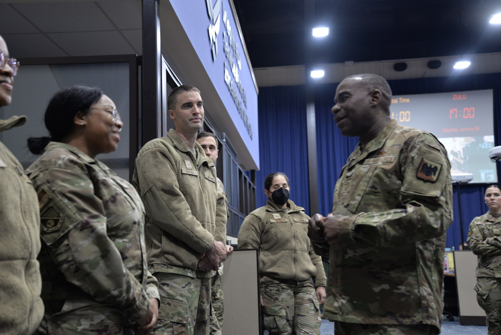 U.S. Air Force Chief Master Sgt. Maurice Williams, right, command chief, Air National Guard (ANG) speaks with Airmen on the operations floor of the 186th Air Operations Group, 186 Air Refueling Wing during his visit to Key Field Air National Guard Base, Meridian, Mississippi, Jan. 6, 2024.
