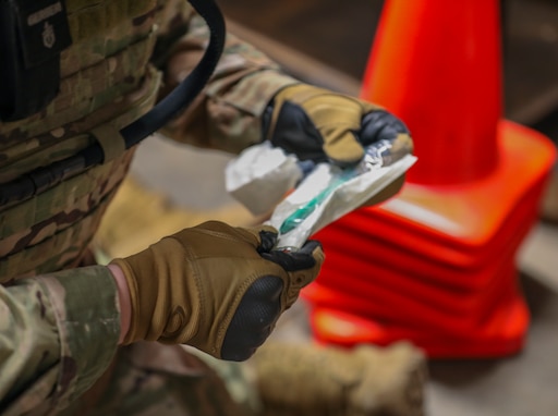 U.S. Army Reserve Soldier opens a liter during Combat Lifesaver Course