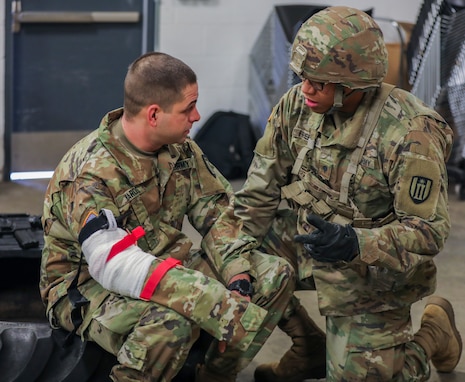 U.S. Army Reserve Soldier opens a liter during Combat Lifesaver Course