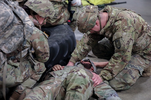 U.S. Army Reserve Soldier opens a liter during Combat Lifesaver Course