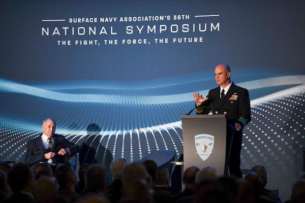 ARLINGTON Va. (Jan. 09, 2024)  Commander, Naval Surface Forces, U.S. Pacific Fleet Vice Adm. Brendan McLane delivers remarks at the Surface Navy Association’s (SNA) 36th National Symposium. The Symposium brings together joint experts and decision-makers in the military, industry, and Congress to discuss how the Surface Force is a critical element of national defense and security. (U.S. Navy photo by Mass Communication Specialist 1st Class Kelby Sanders)