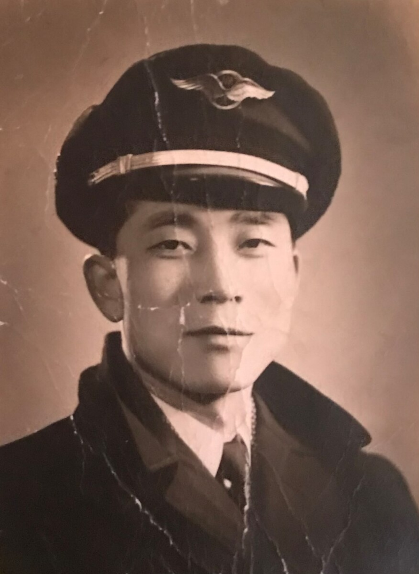 Republic of Korea Air Force senior noncommissioned officer 장용선 (Young Sun Chang) poses for an official photo in South Korea, 1952.