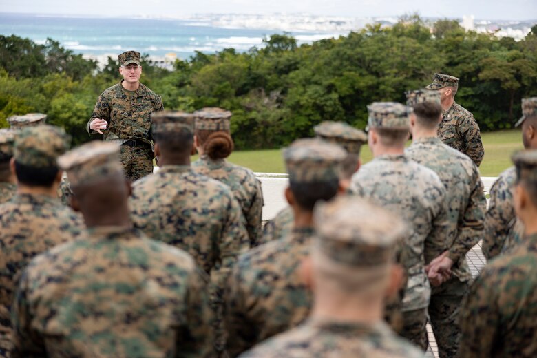 U.S. Marine Corps Staff Sgt. Craig Larkin, the Marine Aircraft Group 36 Headquarters career planner, meritoriously promotes to the rank of gunnery sergeant on Marine Corps Air Station (MCAS) Futenma, Okinawa, Japan, Dec. 22, 2023. Larkin promoted as the recipient of the 2023 Career Planner of the Year Award. (U.S. Marine Corps photo by Lance Cpl. Sav Ford)