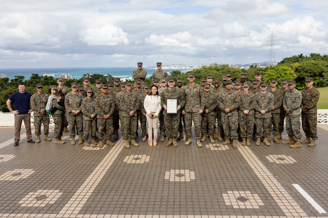 U.S. Marine Corps Staff Sgt. Craig Larkin, the Marine Aircraft Group 36 Headquarters career planner, meritoriously promotes to the rank of gunnery sergeant on Marine Corps Air Station (MCAS) Futenma, Okinawa, Japan, Dec. 22, 2023. Larkin promoted as the recipient of the 2023 Career Planner of the Year Award. (U.S. Marine Corps photo by Lance Cpl. Sav Ford)