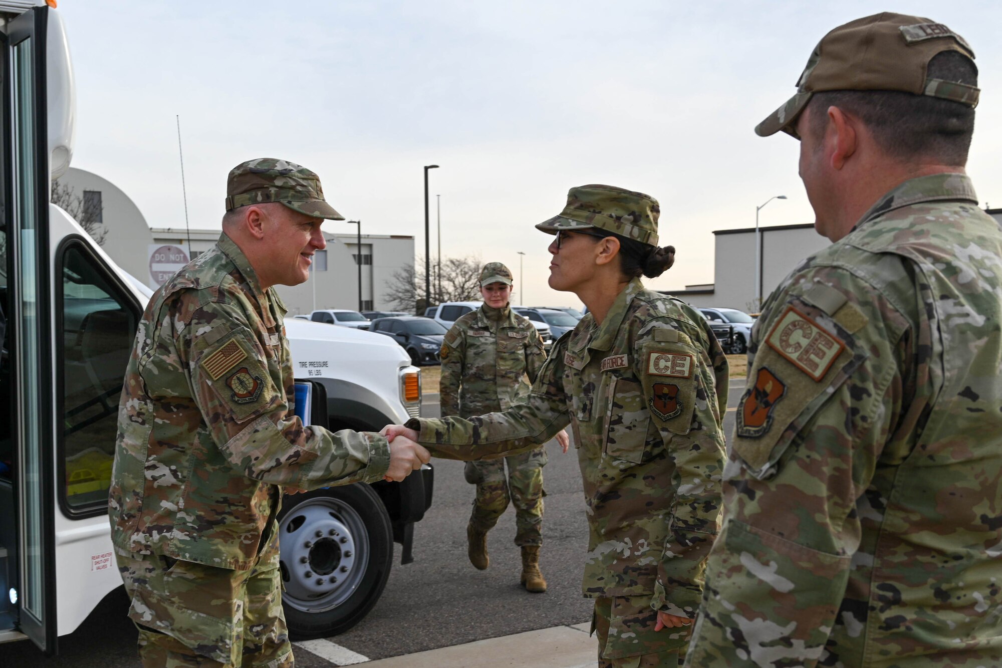 U.S. Air Force Lt. Col. Teresa Rose, 97th Civil Engineer Squadron (CES) individual mobilization augmentee, and Maj. David Leonard, 97th CES operations flight commander, greet Brig. Gen. William Kale, Air Force Civil Engineer Center (AFCEC) commander, at Altus Air Force Base, Oklahoma, Dec. 12, 2023. AFCEC oversees all CE requirements across the Air Force including facility investment planning, design and construction, operations support, property management and oversight, energy support, environmental compliance and restoration, and readiness and emergency management. (U.S. Air Force photo by Senior Airman Miyah Gray)