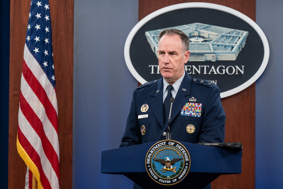 A man stands at a podium.