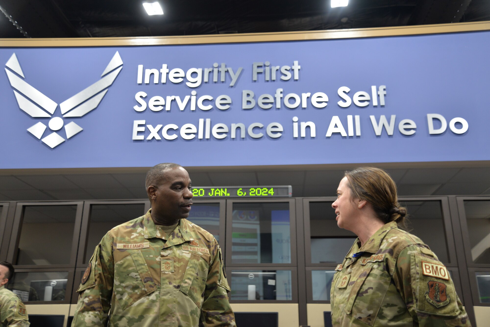 U.S. Air Force Chief Master Sgt. Maurice Williams, left, command chief, Air National Guard (ANG) speaks with Chief Master Sgt. Audrey Griffon on the operations floor of the 186th Air Operations Group, 186th Air Refueling Wing, Mississippi National Guard, during his visit to Key Field ANG Base, Meridian, Mississippi, Jan. 6, 2024.