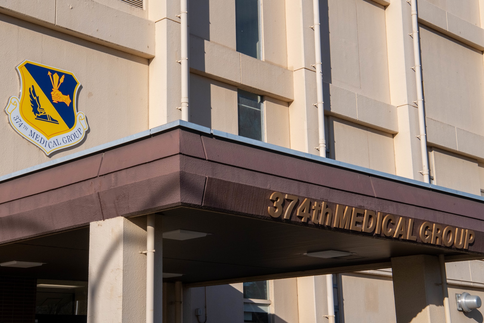 The entrance of the 374th Medical Group (MDG) building.