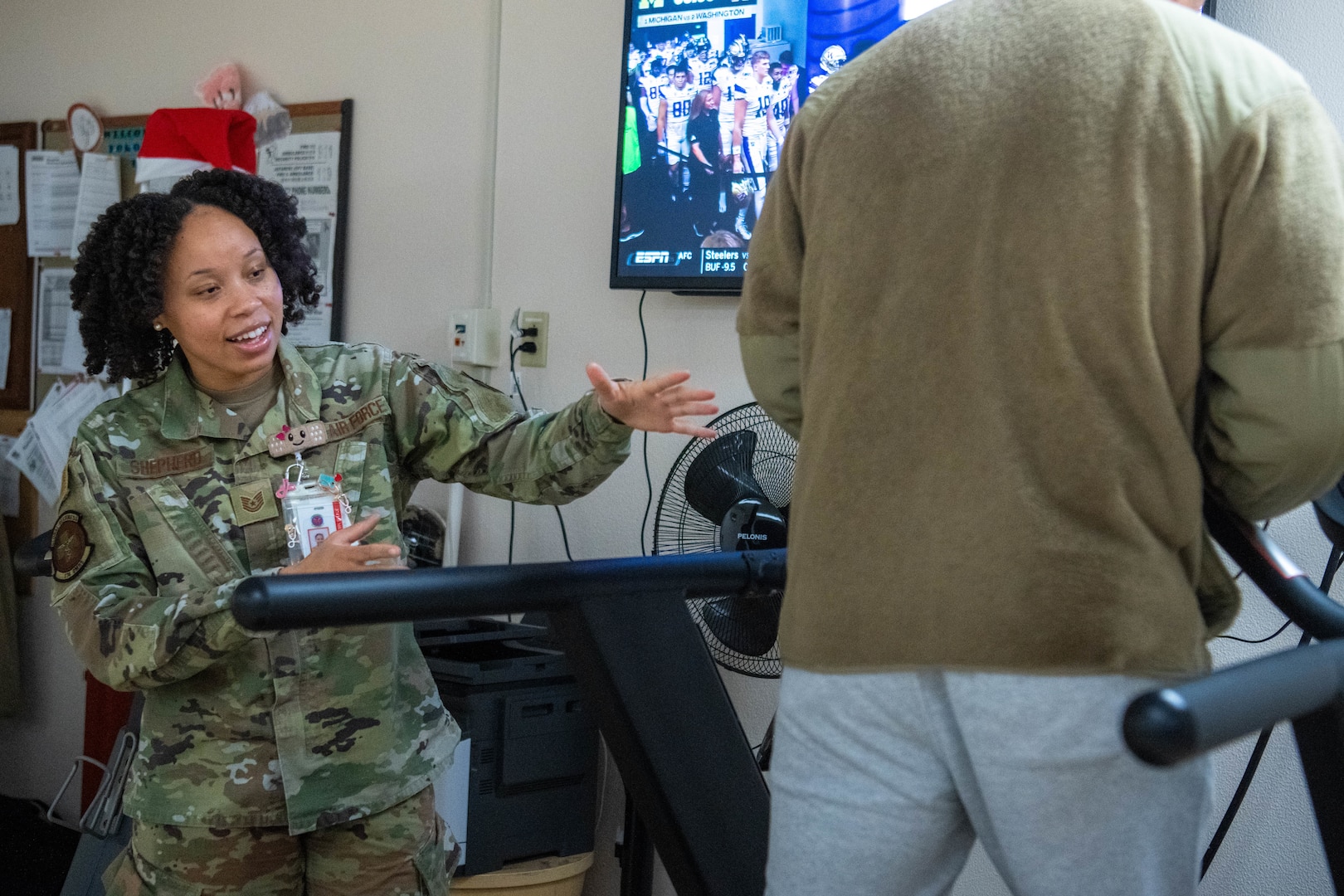 U.S. Air Force Tech Sgt. Morgan Shepherd, 374th Operational Medical Readiness Squadron physical therapy technician, assists a patient.