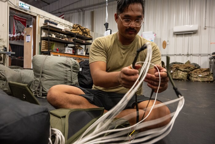 Airmen prepare aircrew flight equipment.