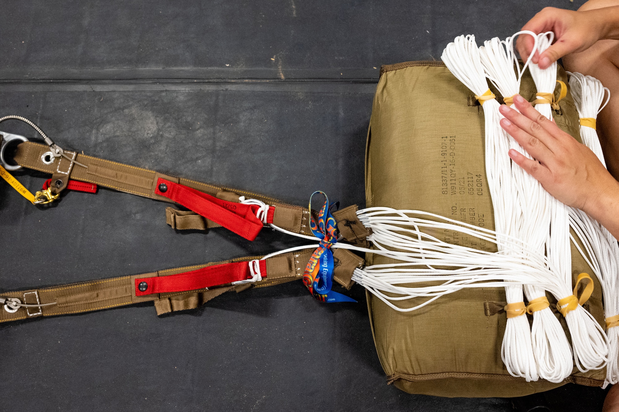 Airmen prepare aircrew flight equipment.