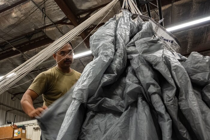 Airmen prepare aircrew flight equipment.
