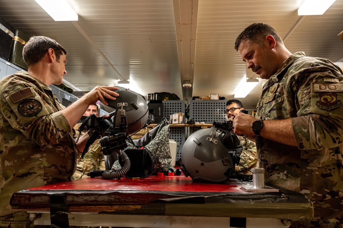 Airmen prepare aircrew flight equipment.