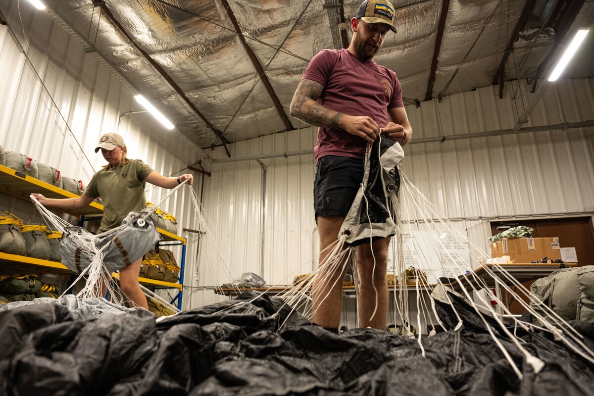 Airmen prepare aircrew flight equipment.