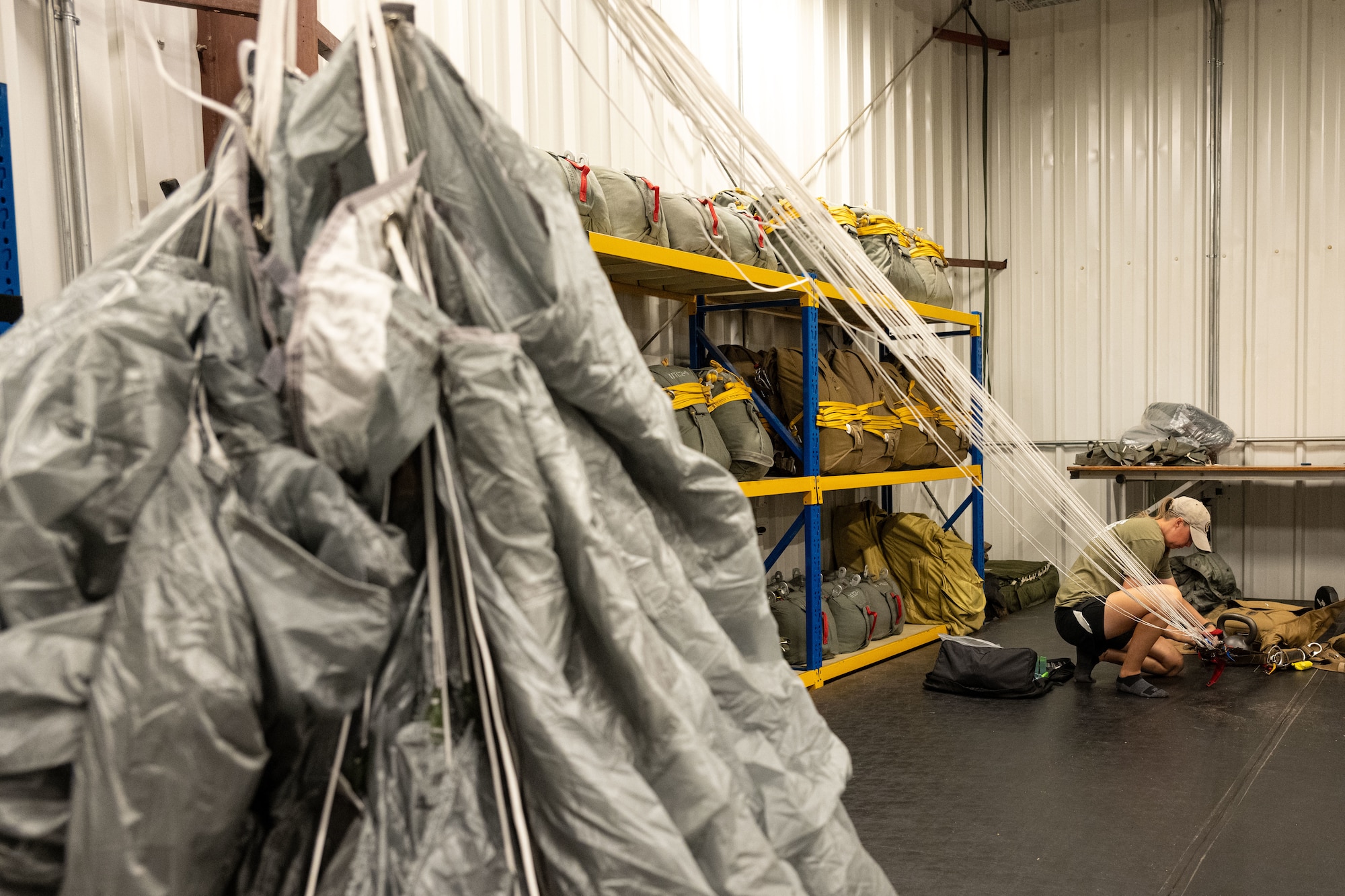 Airmen prepare aircrew flight equipment.
