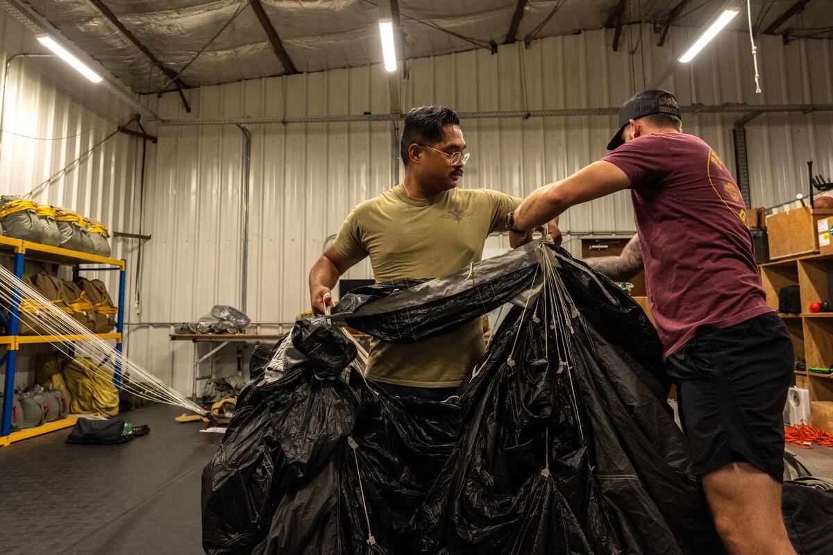 Airmen prepare aircrew flight equipment.