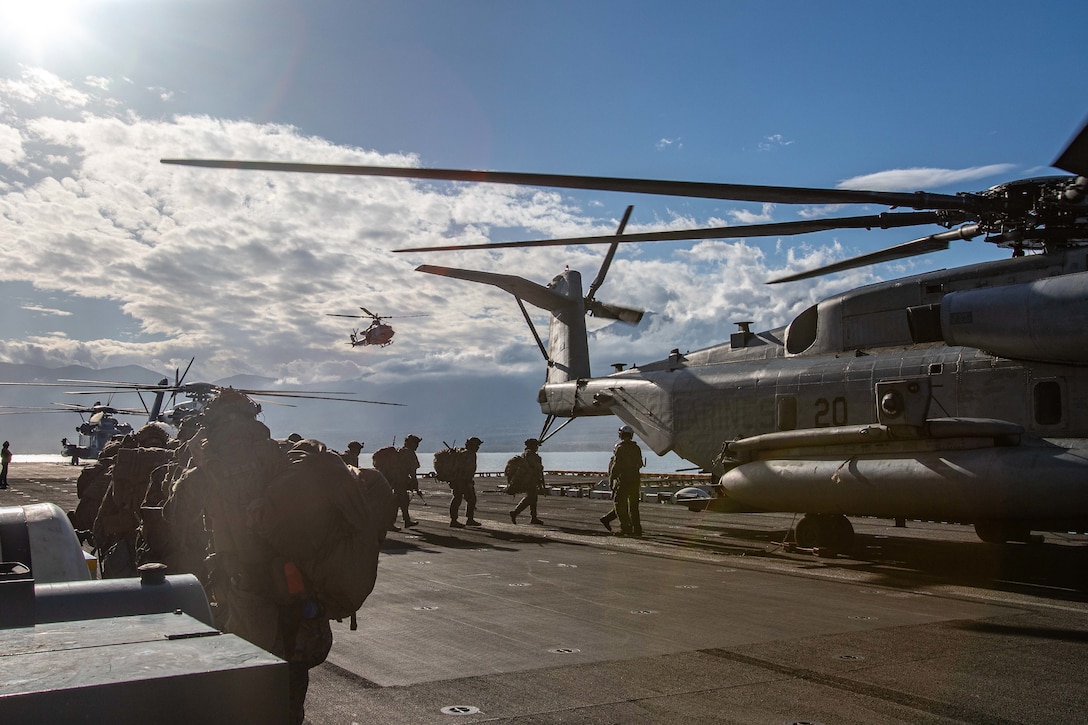 U.S. Marines with Alpha Company, Battalion Landing Team 1/6, 26th Marine Expeditionary Unit (Special Operations Capable), board a CH-53E Super Stallion during an amphibious assault as part of Odyssey Encore, Volos, Greece, Jan. 8, 2024. The 26th Marine Expeditionary Unit (Special Operations Capable)’s Marine Air-Ground Task Force sustainment training enhances readiness and operational capabilities as the Tri-Geographic Combatant Command crisis response force and Joint Staff Immediate Response Force. The Bataan Amphibious Ready Group, with the embarked 26th Marine Expeditionary Unit (Special Operations Capable), is on a scheduled deployment in the U.S. Naval Forces Europe area of operations, employed by U.S. Sixth Fleet to defend U.S., Allied and partner interests.