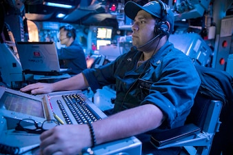 OS2 Juan Hurtadobayas stands surface warfare supervisor watch aboard USS Sterett (DDG 104).