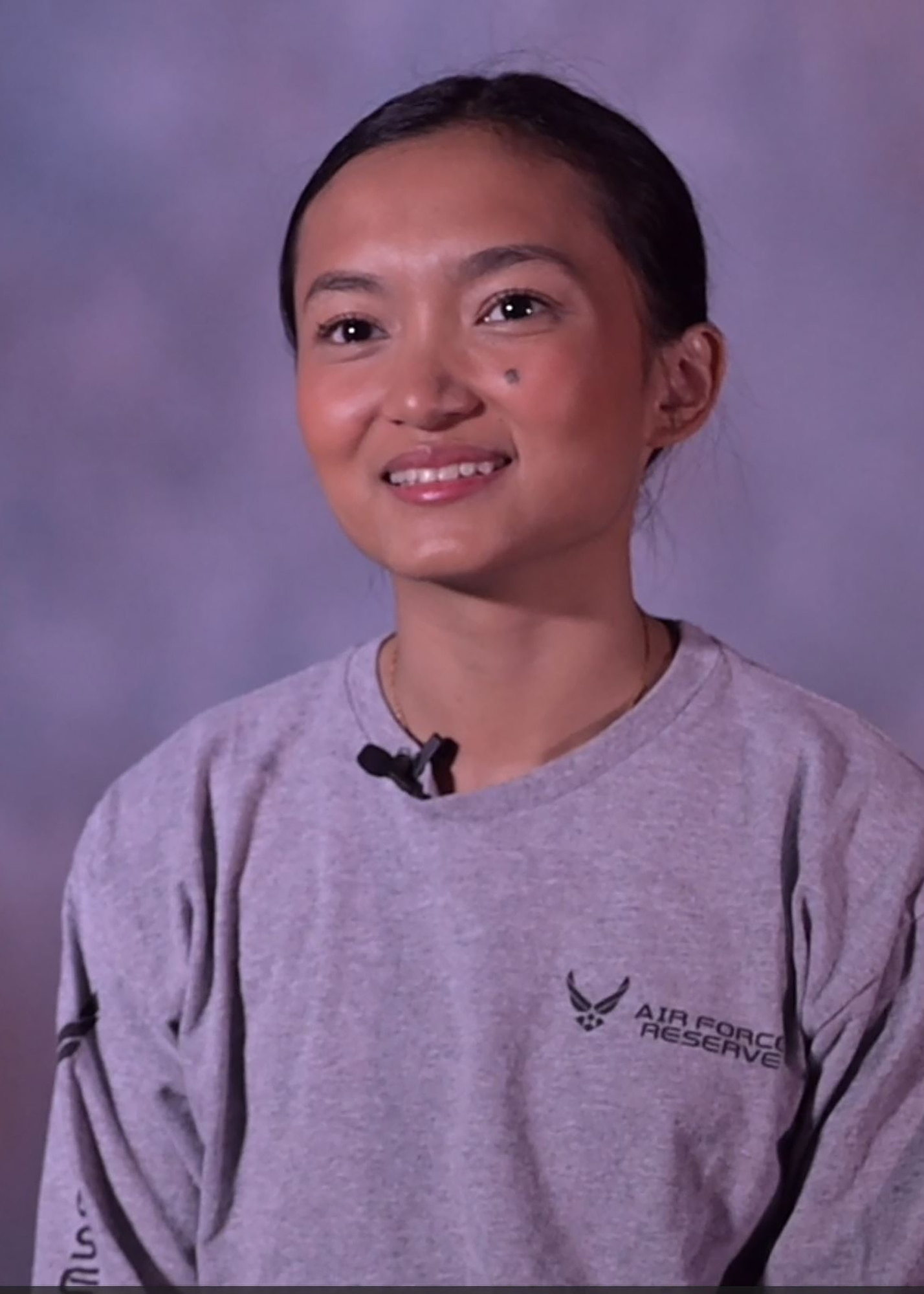 Photo of smiling Airman.