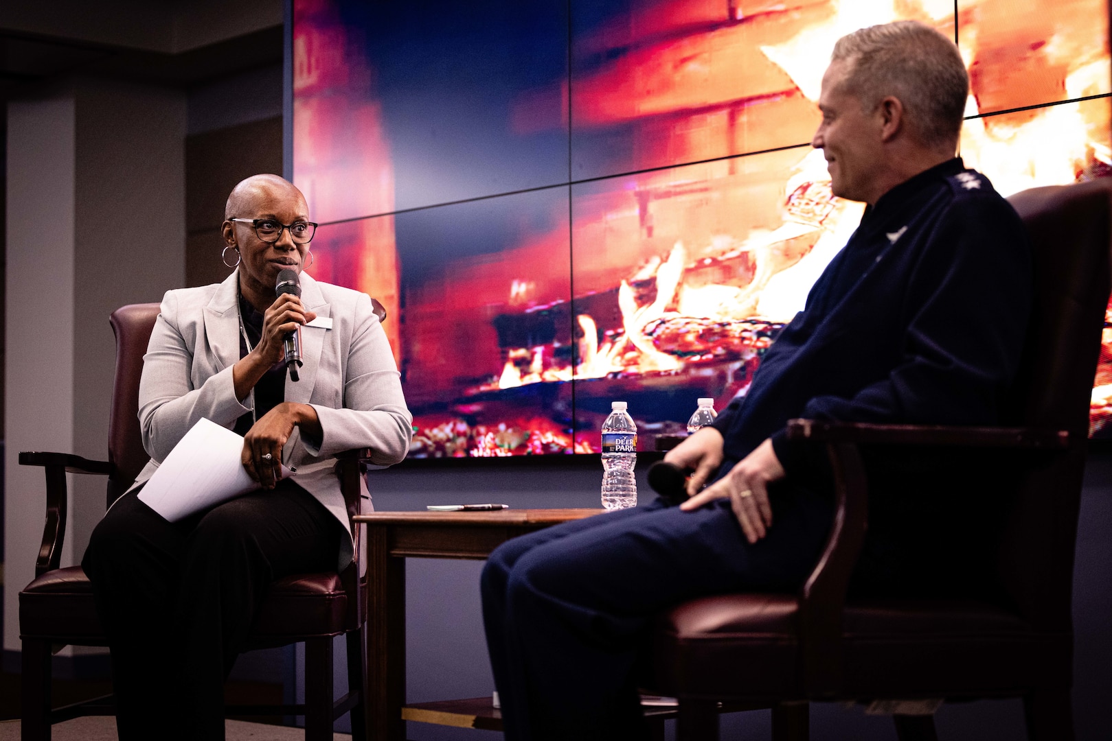 From left, Dr. Cassandra C. Lewis, Chancellor at the National Defense University, talks to Air Force Lt. Gen. Timothy D. Haugh, Deputy Commander of USCYBERCOM, during the Fire Side Chat of the Cyber Symposium at the National Defense University in Washington, D.C. on December 5, 2023.