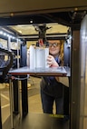 Moonshine Lab employee Kati Pero, toolmaker, Shop 31, Inside Machinist, has spent the past month collaborating with a Puget Sound Naval Shipyard & Intermediate Maintenance Facility customer on an innovative STEM 3D-printing project, at the command in Bremerton, Washington. (U.S Navy photo by Wendy Hallmark)