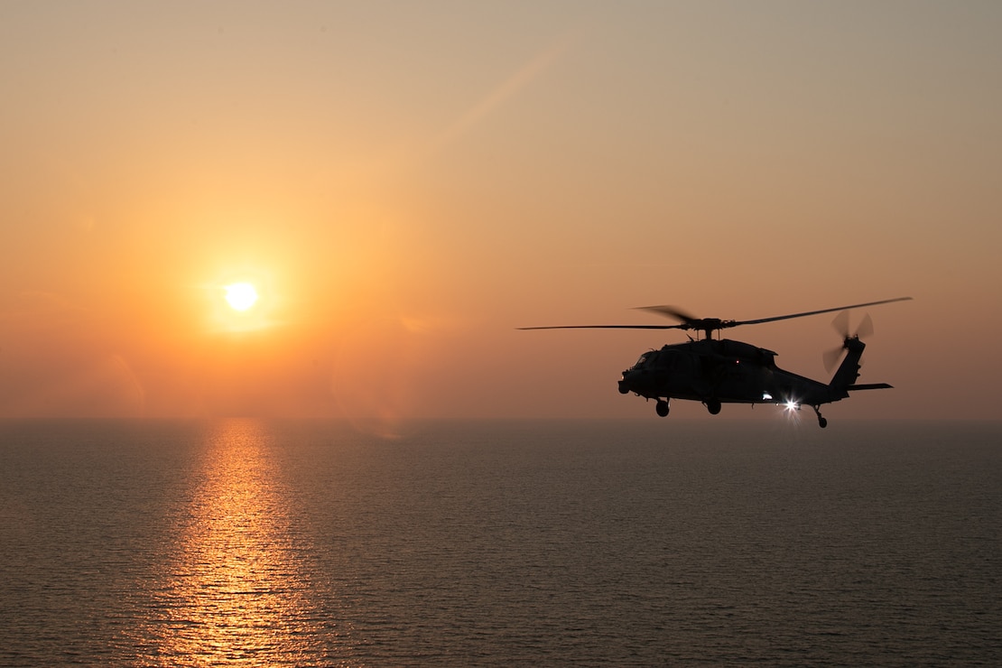 An MH-60S attached to Helicopter Sea Combat Squadron (HSC) 9 flies over the Mediterranean Sea, Aug. 16, 2023. HSC-9 is deployed aboard the world's largest aircraft carrier USS Gerald R. Ford (CVN 78) as part of Carrier Air Wing (CVW) 8. Gerald R. Ford is the U.S. Navy's newest and most advanced aircraft carrier, representing a generational leap in the U.S. Navy's capacity to project power on a global scale. The Gerald R. Ford Carrier Strike Group is on a scheduled deployment in the U.S. Naval Forces Europe area of operations, employed by U.S. Sixth Fleet to defend U.S., allied, and partner interests. (U.S. Navy photo by Mass Communication Specialist 2nd Class Jackson Adkins)