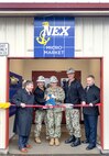 From left, Robert Bianchi, chief executive officer, Navy Exchange Service Command; Master Chief Michael C. Gosart, command senior enlisted leader, Puget Sound Naval Shipyard &
Intermediate Maintenance Facility; Capt. JD Crinklaw, commander, PSNS & IMF; Rear Adm. Scott M. Brown, deputy commander, Industrial Operations, Naval Sea Systems Command; and James Cook, deputy executive director, PSNS & IMF, cut the ribbon to officially open the new NEXCOM Micro Market inside Building 1246, at the command in Bremerton, Washington, Dec. 7, 2023. (U.S Navy Photo by Wendy Hallmark)