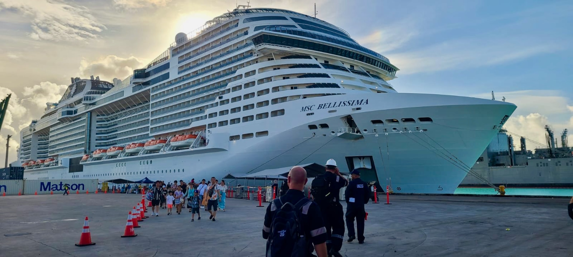 A team from U.S. Coast Guard Forces Micronesia/Sector Guam and the U.S. Coast Guard Cruise Ship National Center of Expertise conduct a Certificate of Compliance (COC) exam on the 1,036-foot Maltese-flagged cruise ship MSC Bellissima on its first-ever U.S. port call at the Port of Guam, on Jan. 3, 2024. The U.S. Coast Guard conducts COC exams for new or existing vessels that are embarking passengers from a U.S. port for the first time, carrying U.S. citizens as passengers with initial port calls at U.S. ports, or have undergone significant modifications or alterations including changes that affect structural fire protection or means of egress, in order to ensure these vessels, meet required safety and regulatory standards. (U.S. Coast Guard photo by Chief Warrant Officer Jennifer Thomas)