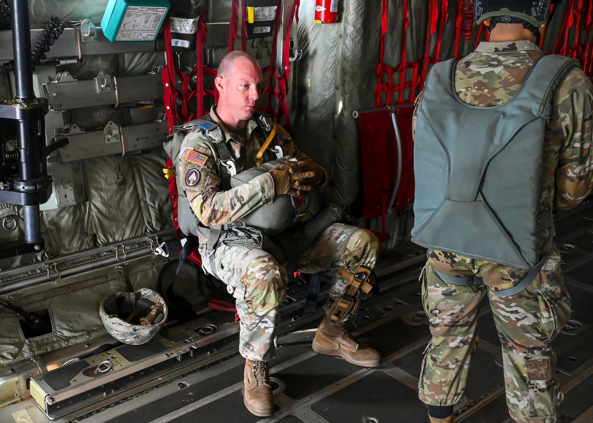 U.S. Army Reserve Chief Warrant Officer 3 Joseph Kiernan sits on the C-130J waiting for takeoff.