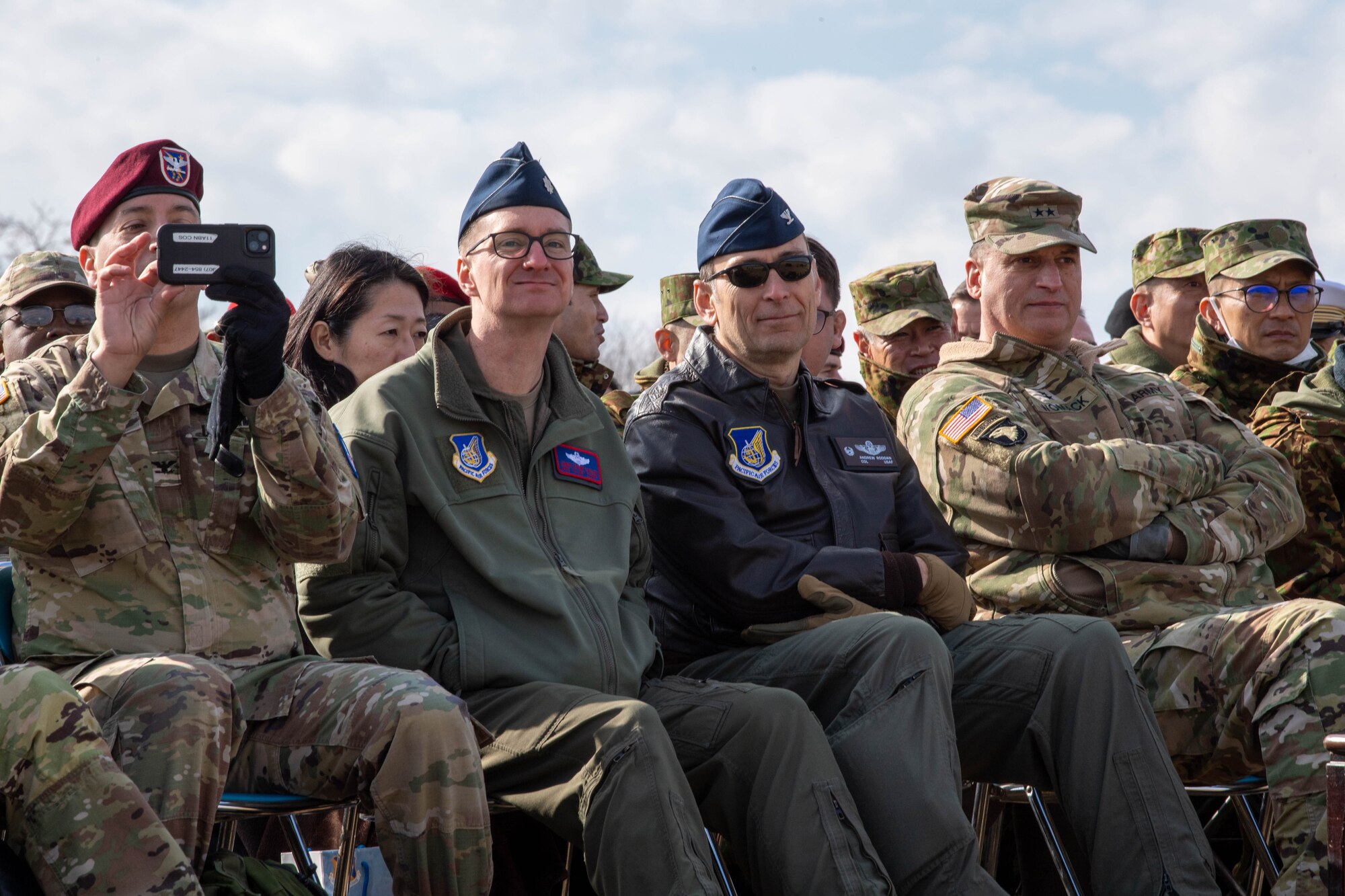 U.S. Air Force Col. Andrew Roddan, 374th Airlift Wing commander, and U.S. Air Force Lt. Col. Christopher Casler, 374th Operations Group deputy commander, observe the annual New Year's Jump exhibition at Camp Narashino, Japan.