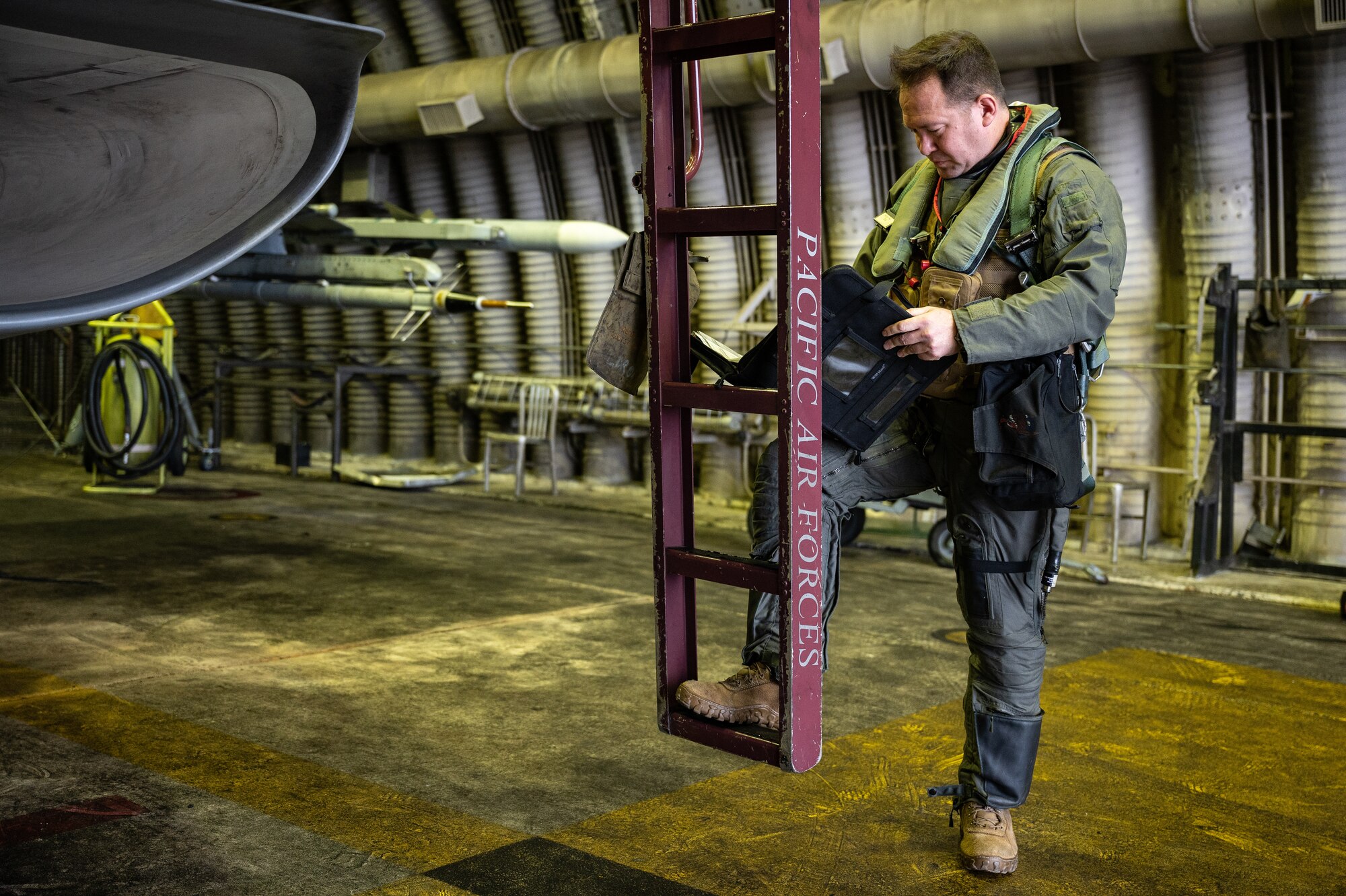U.S. Air Force Lt. Col. Alexis Scott, 36th Fighter Squadron pilot, conducts preflight checks at Osan Air Base, Republic of Korea, Jan. 9, 2024. The preflight process for ensuring the F-16’s are ready to “Fight Tonight” includes tasks like inspecting the aircraft to ensure that there are no major flaws and testing the functions of the aircraft to ensure they are working properly. (U.S. Air Force photo by Airman 1st Class Chase Verzaal)