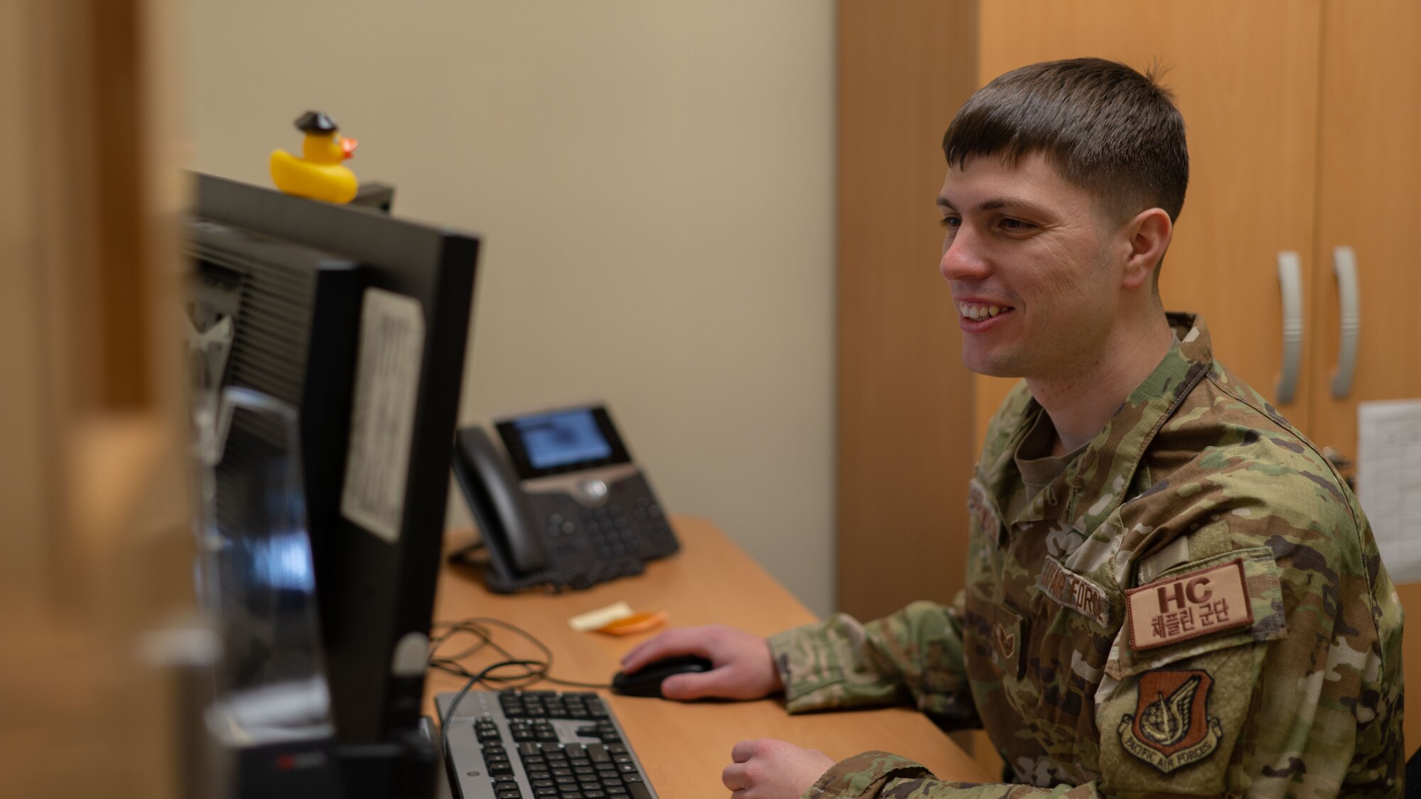 Staff Sgt. Peter Southworth, 8th Fighter Wing chapel, NCO in charge of chapel readiness, reviews electronic notifications after visiting Airmen across the installation