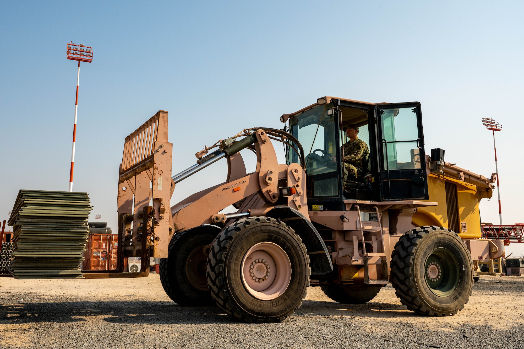 Man operates a forklift