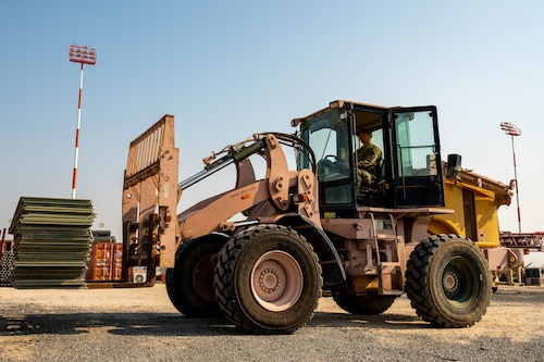 Man operates a forklift