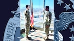 Airman reaffirms commitment during reenlistment ceremony