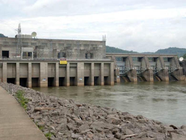 Cordell Hull Dam, gray dam with bank on left and water on right