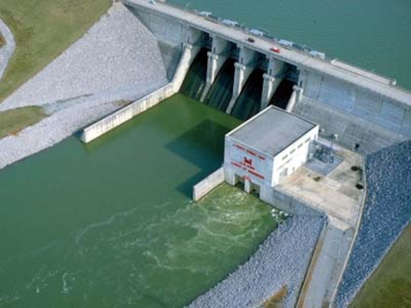 J. Percy Priest Dam seen from above, with greenish water.