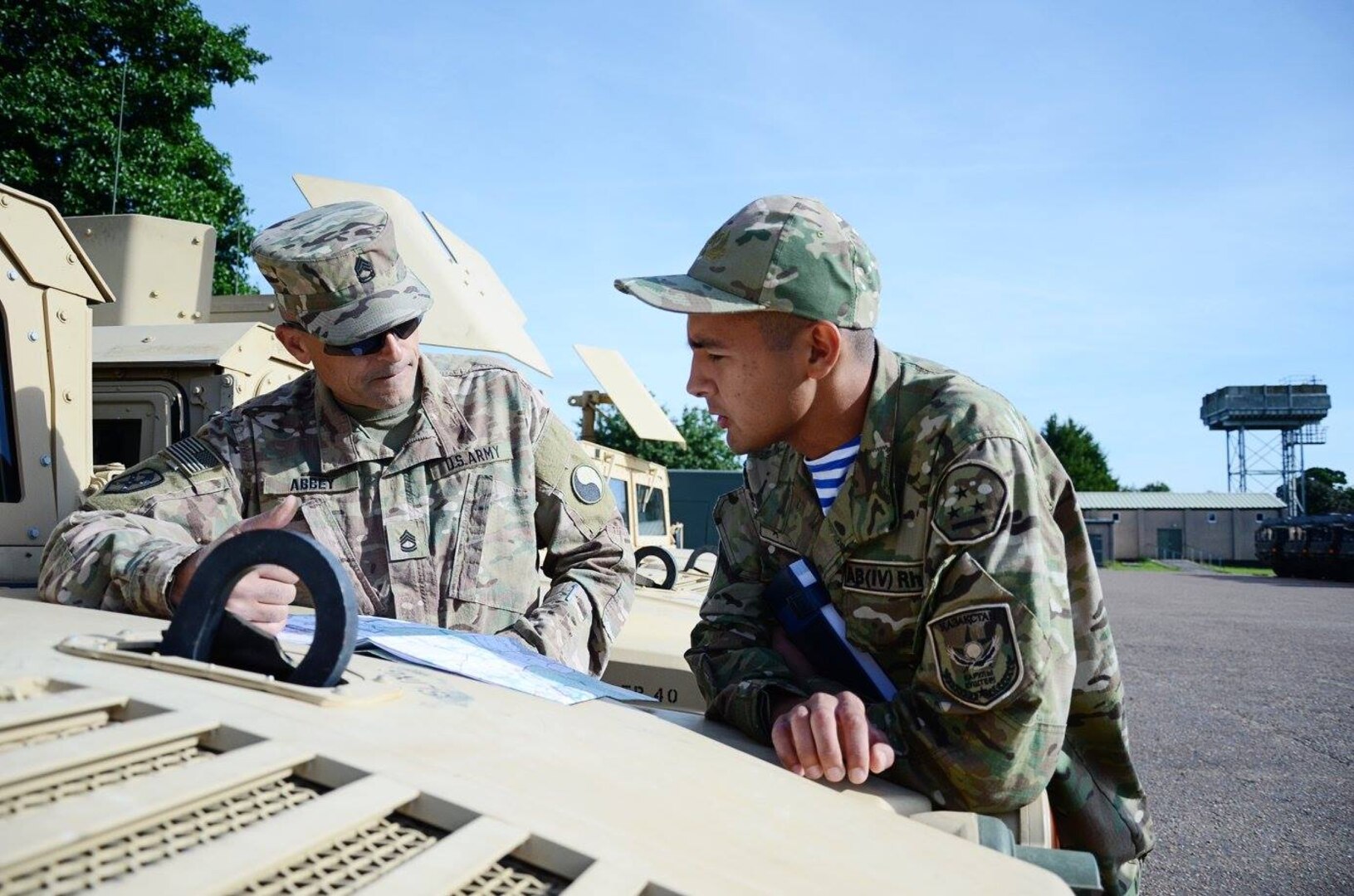 U.S. Soldier and Kazakh Soldier talking