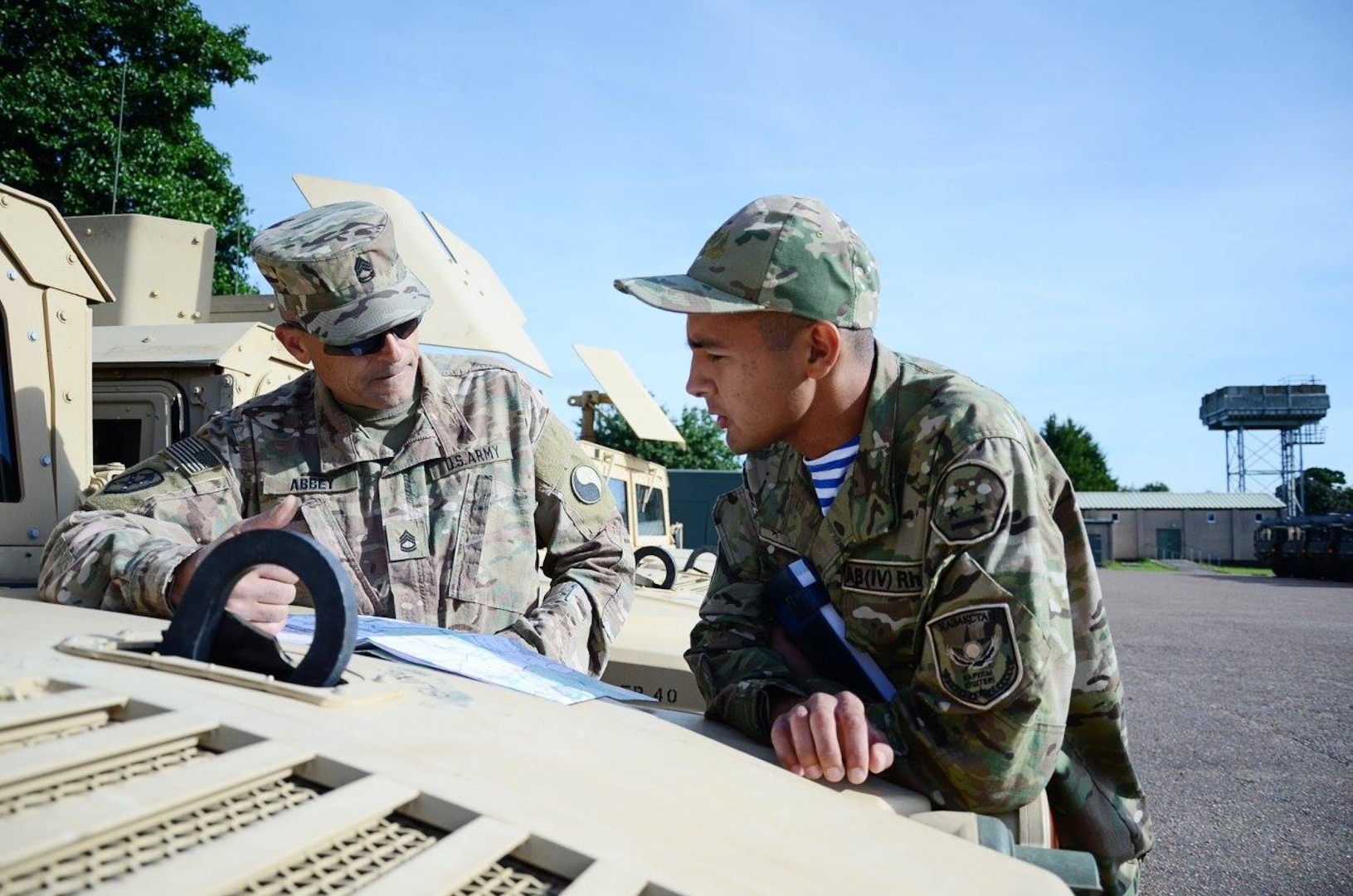 U.S. Soldier and Kazakh Soldier talking